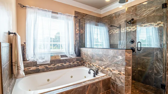 Low-threshold walk-in shower in a Newark, NJ home