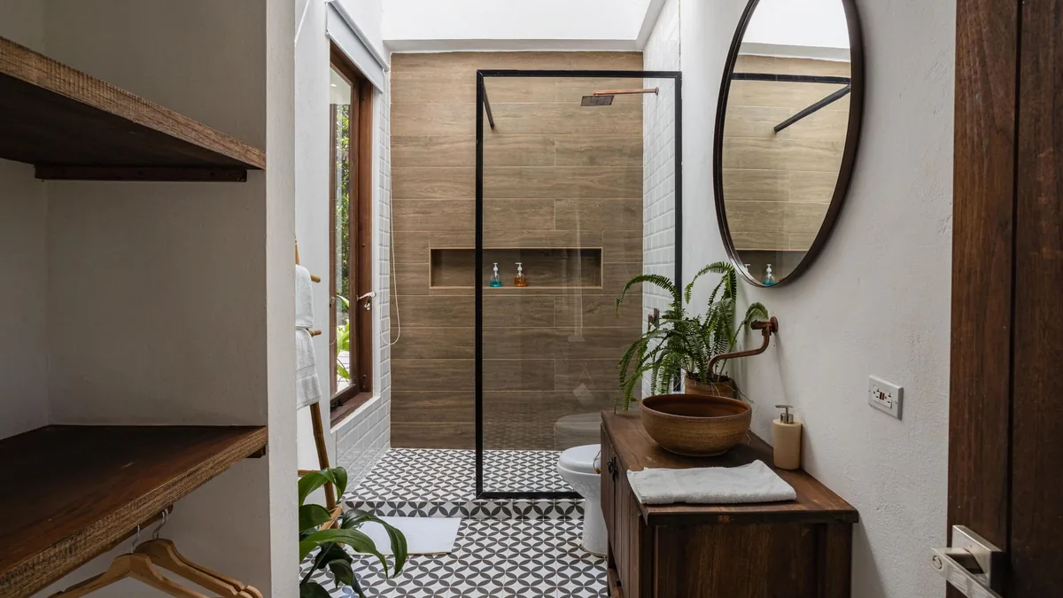 Low-threshold walk-in shower installed in a Newark, NJ bathroom